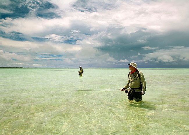 Kevin looking at the Cozumel waters to decide where to fly fish next.