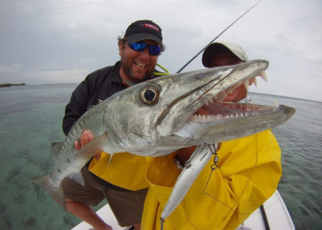 James and his brother very happy with their fishing day in Cozumel.